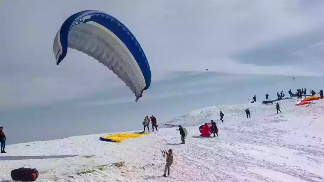 Paragliding launch site in Himachal mountain valley