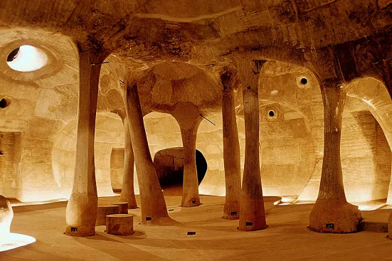 Cave-like interior gallery space at Amdavad ni Gufa