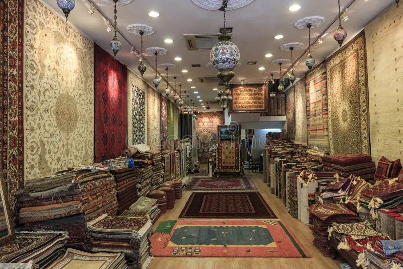 Traditional carpet shop displaying Persian rugs