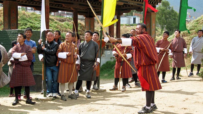 Bhutanese archery team celebration after a successful hit