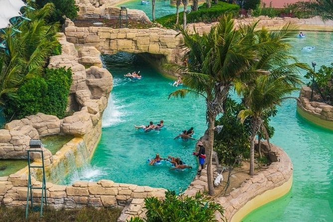 Lazy river at Aquaventure Waterpark with lush tropical landscaping