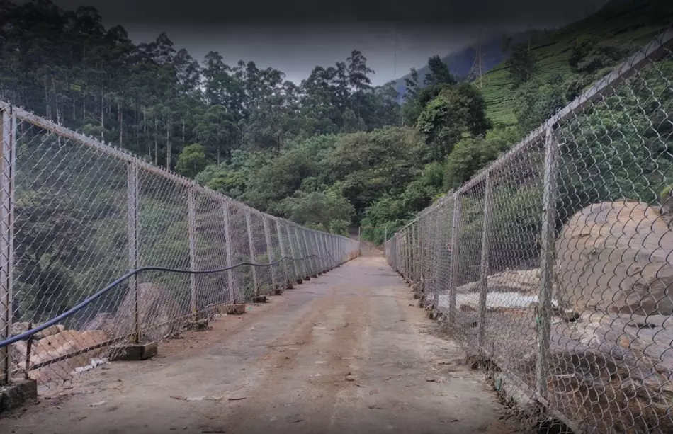 Bridge and trail near Attukad waterfalls in Munnar