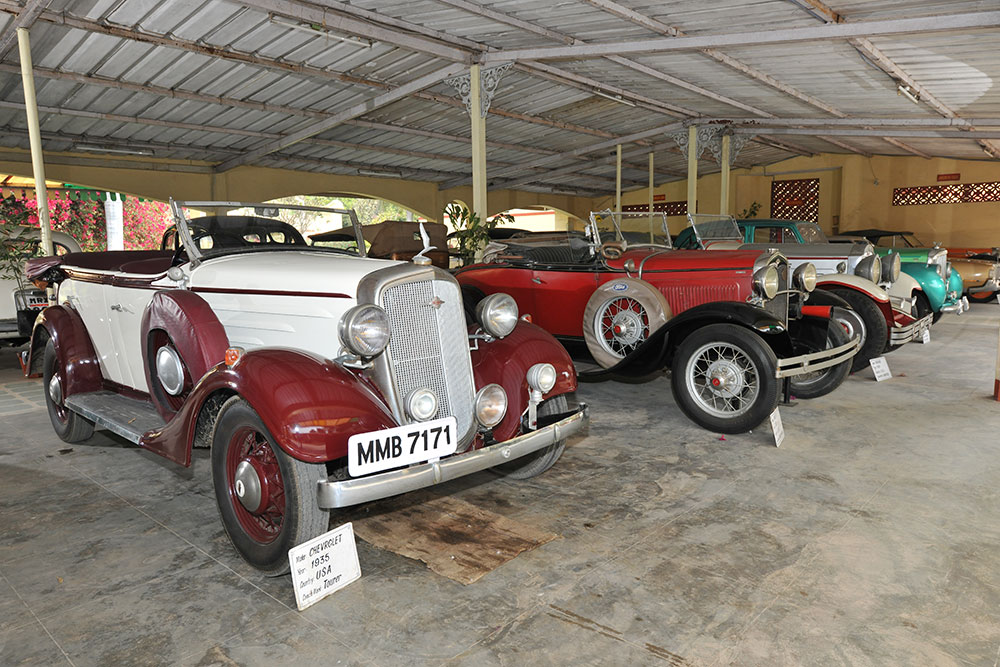 Vintage convertible cars displayed at Auto World