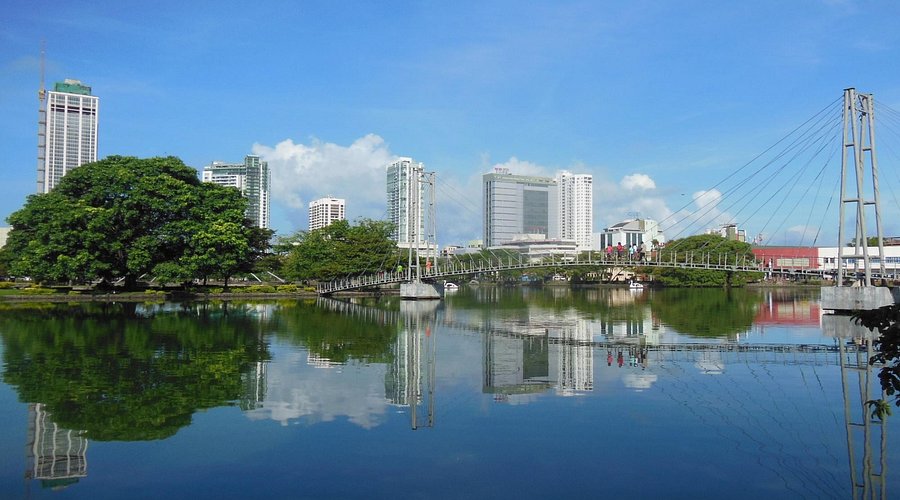 Lakeside walkway and calm water at Beira Lake