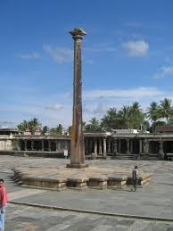 Carved pillars and sculptural detailing inside Belur temple