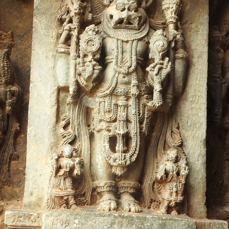 Hoysala sculpture close-up showing fine chisel work