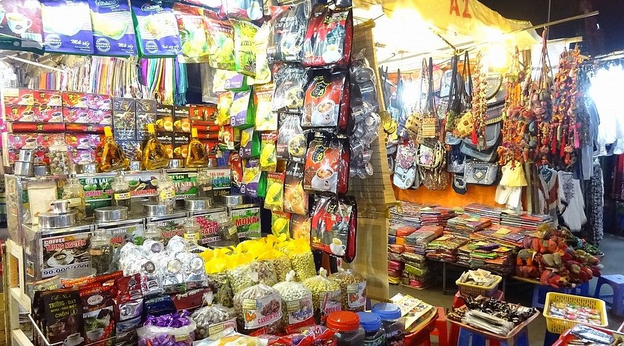 Ben Thanh night market stalls lit up in evening