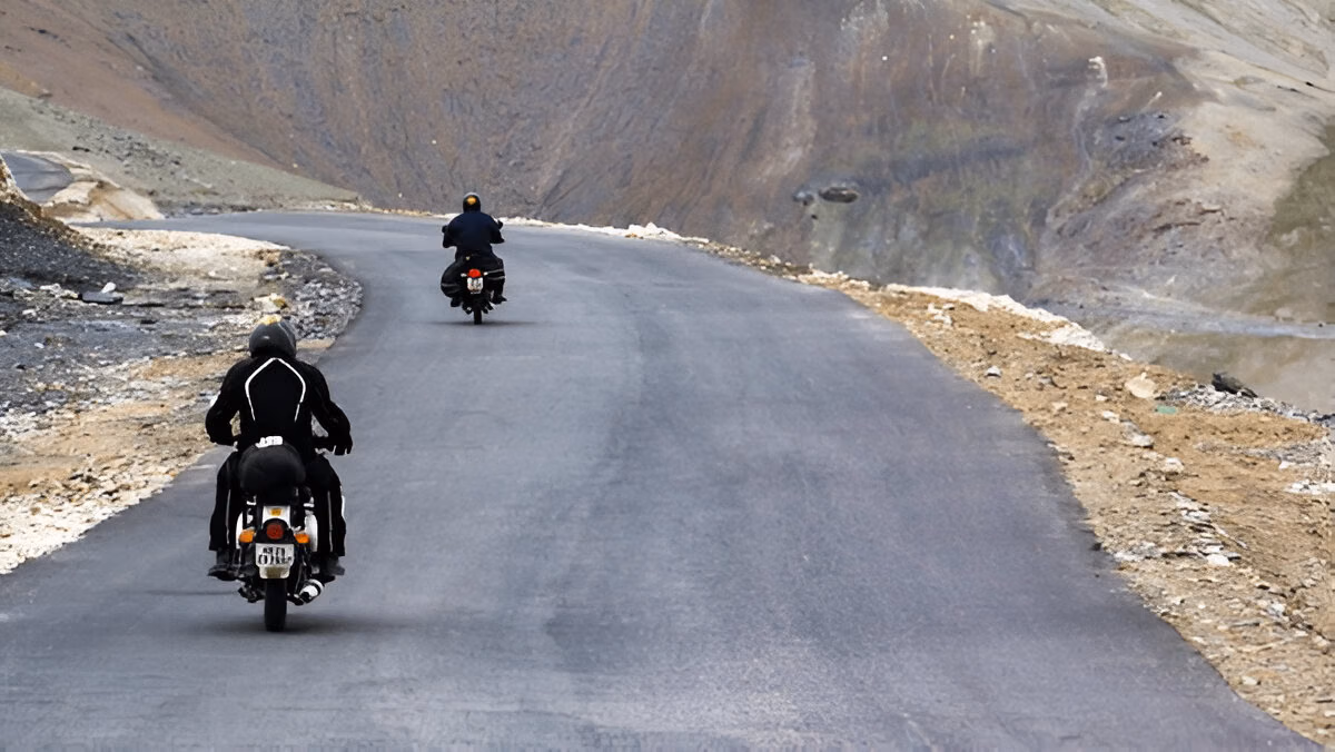 Rental bike crossing high pass in Ladakh