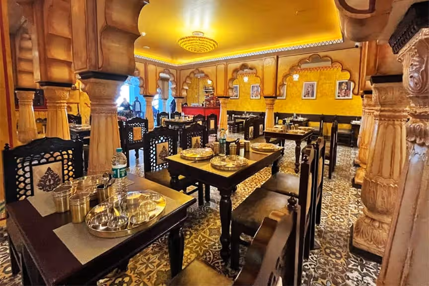 Family-friendly cafe seating with comfortable booths and warm lighting