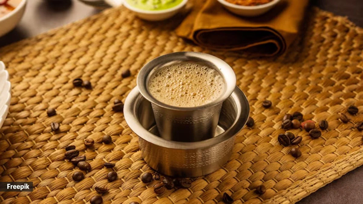 Traditional metal coffee filter brewing authentic South Indian filter coffee