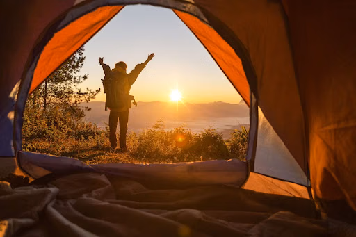 Summer camping in Sonmarg with green meadows and clear skies