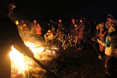 Evening bonfire at Dawki camping site under starry sky