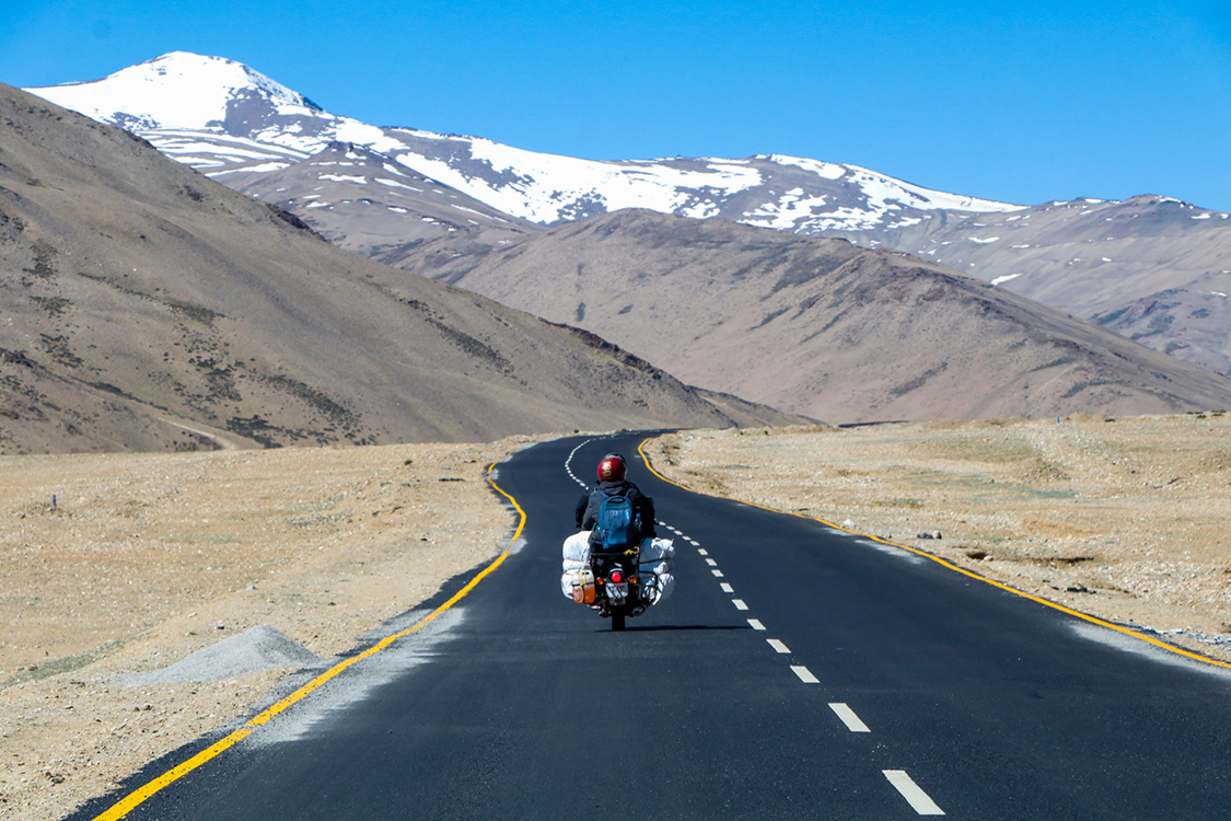 Scenic mountain road in Ladakh with rental car