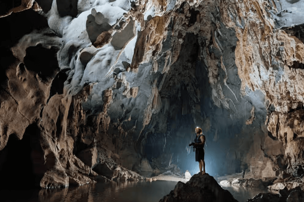Adventure caving activity in Dark Cave Vietnam