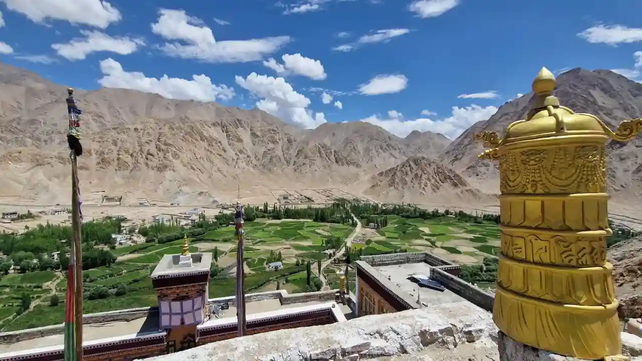 Chemrey Monastery exterior against mountain backdrop