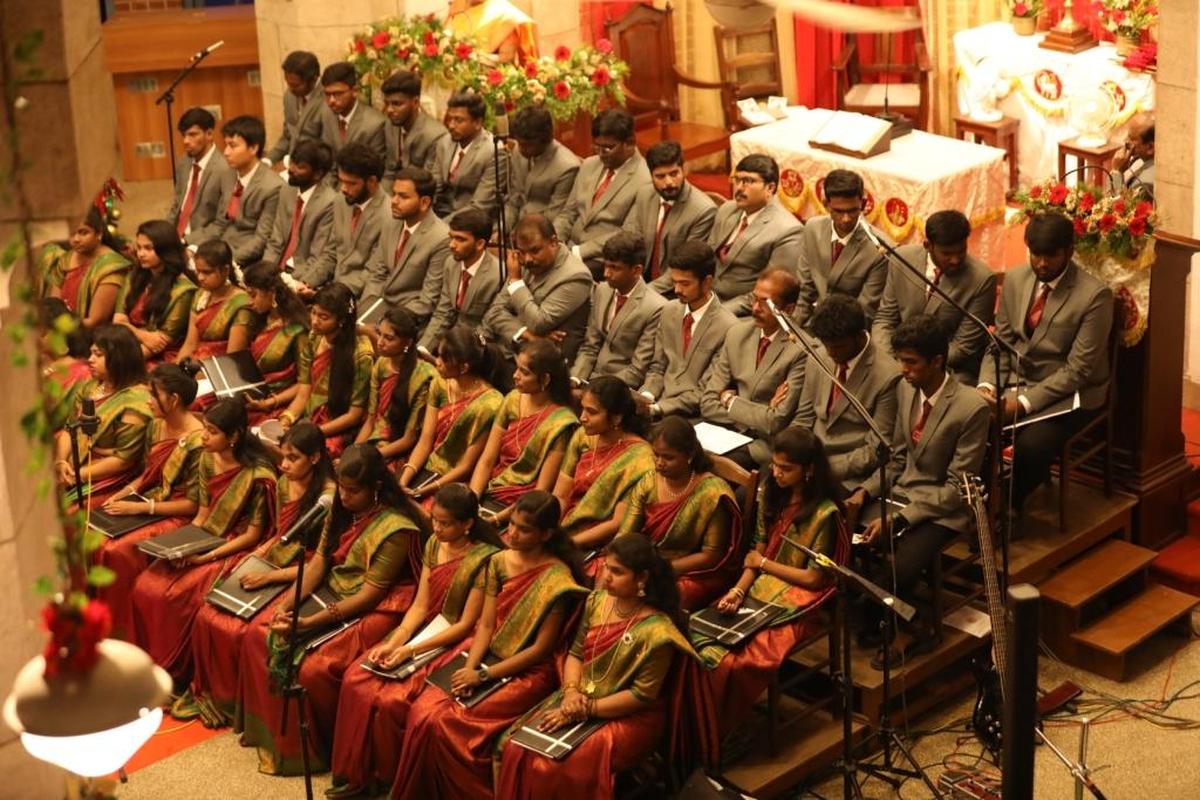 Choir singing Christmas carols inside an Indian church