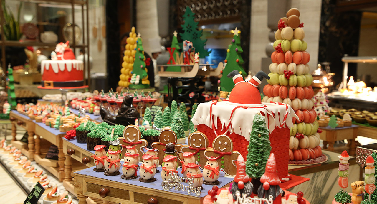 Festive food kiosks and Christmas bakery stalls in an Indian market
