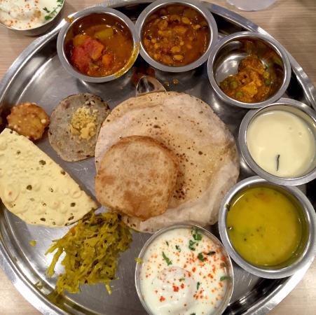 Maharashtrian thali in Pune Dabdhabha style dining