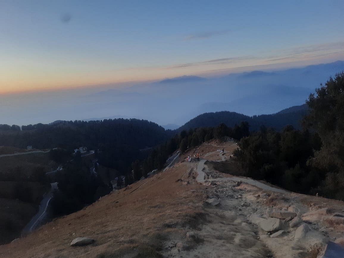 Trekking trail through cedar forests to Dainkund Peak