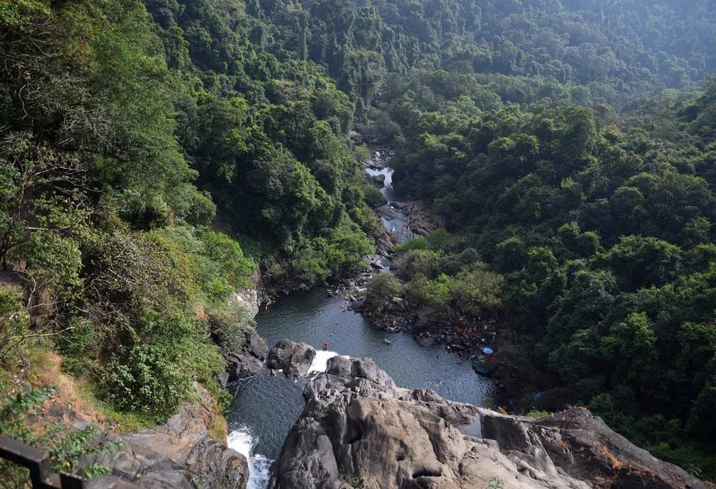 Base view of Dudhsagar Waterfall showing the impressive four-tiered cascade