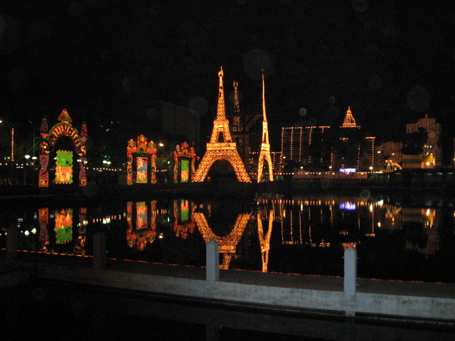 College Square Durga Puja pandal with beautiful lighting reflected on water