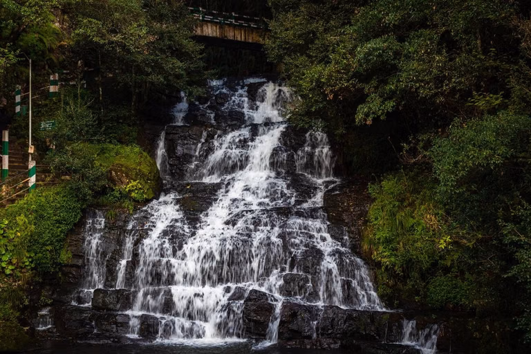 Elephant Falls Meghalaya three tiered cascades surrounded by lush greenery