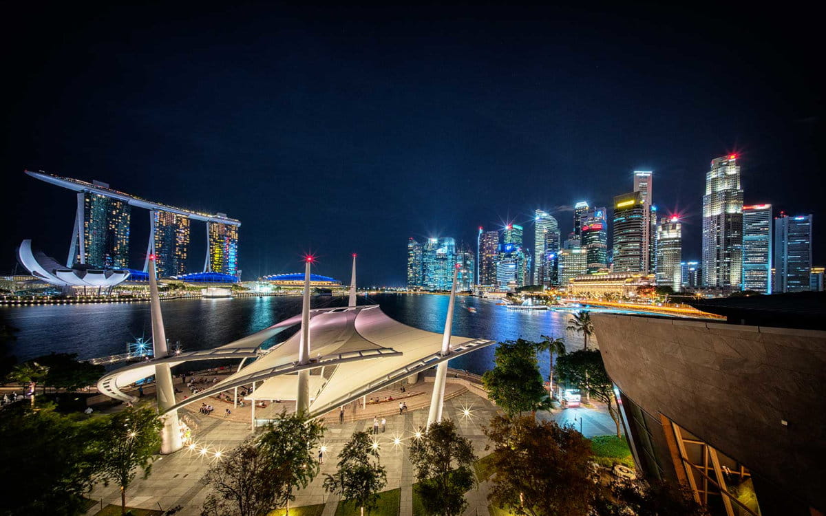 Esplanade waterfront and city-light atmosphere in evening
