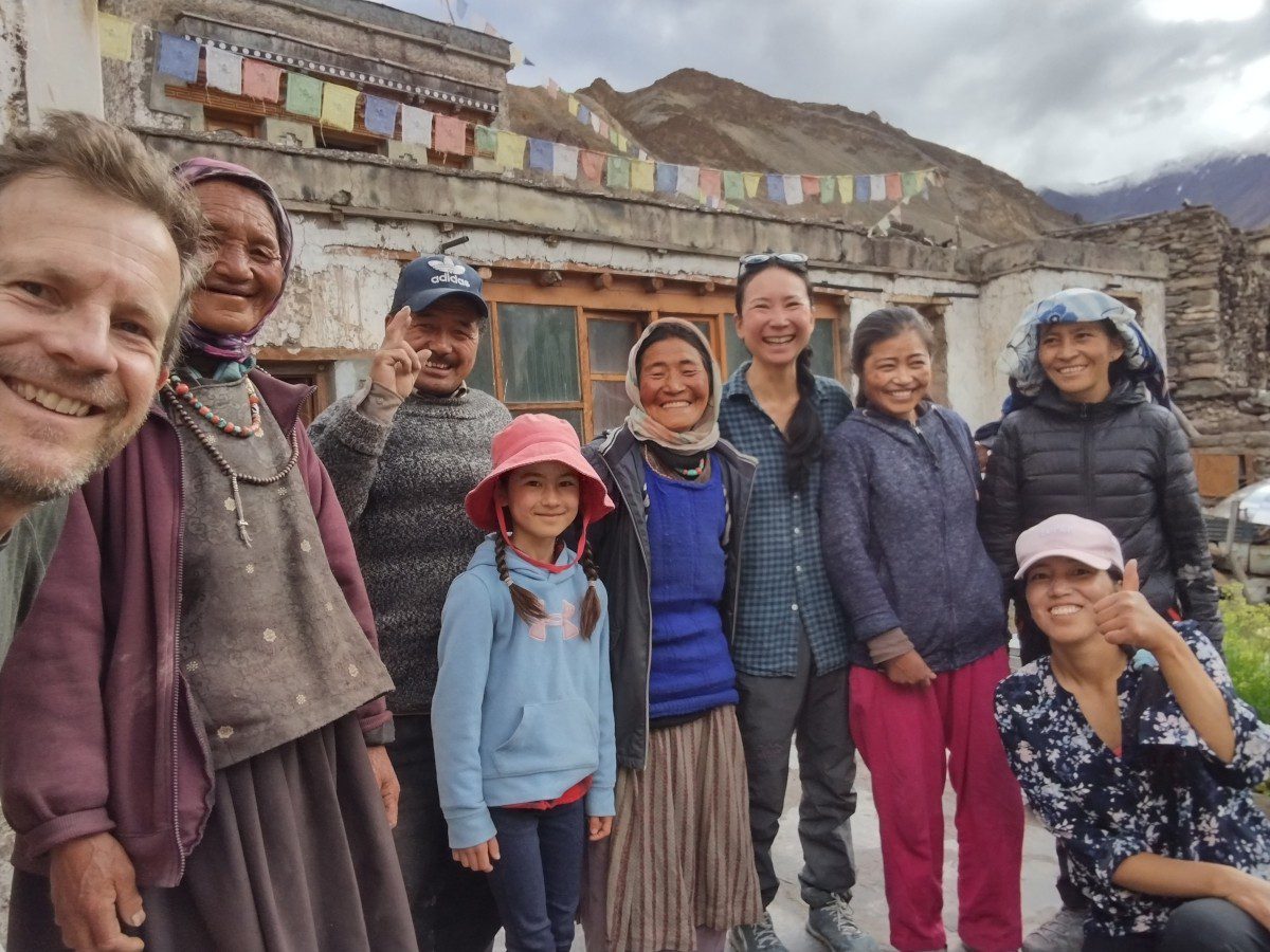 Family enjoying Ladakh trip with mountains