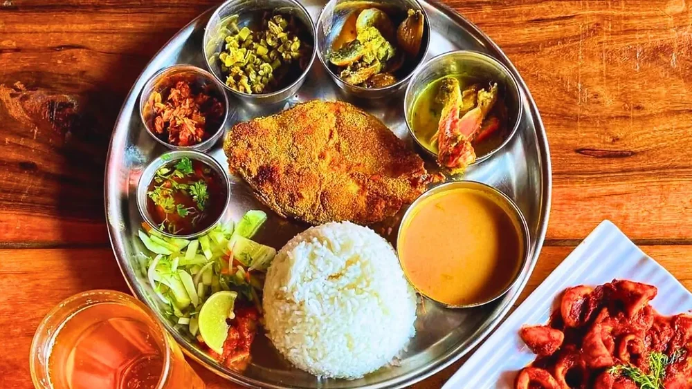 Traditional Goan thali with local dishes