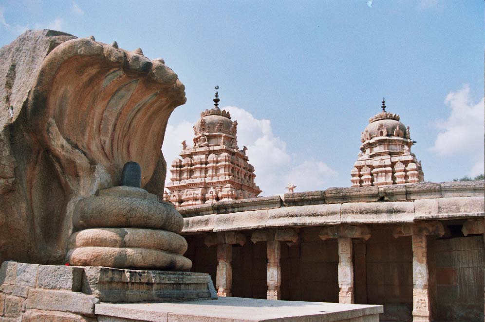 Temple skyline and city-road route concept near Hyderabad