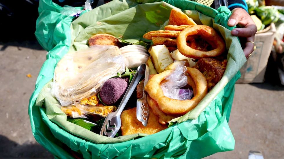 Traveler selecting hygienic food stall in Meghalaya market