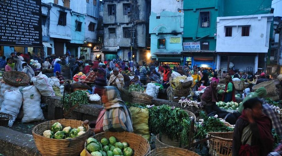 Shillong market food stalls with local snacks and tea counters
