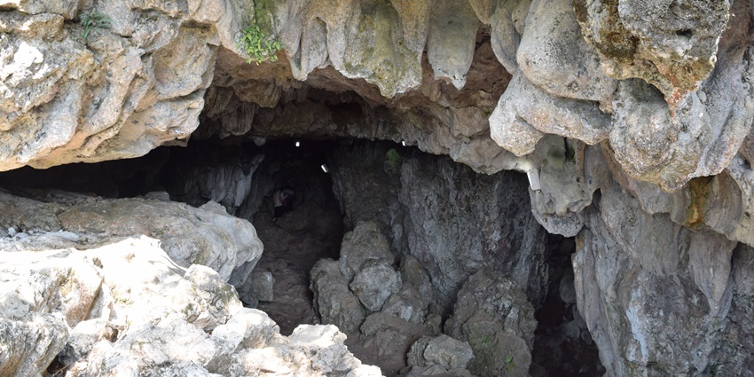 Natural rock formations and cave passage inside Garden of Caves Meghalaya
