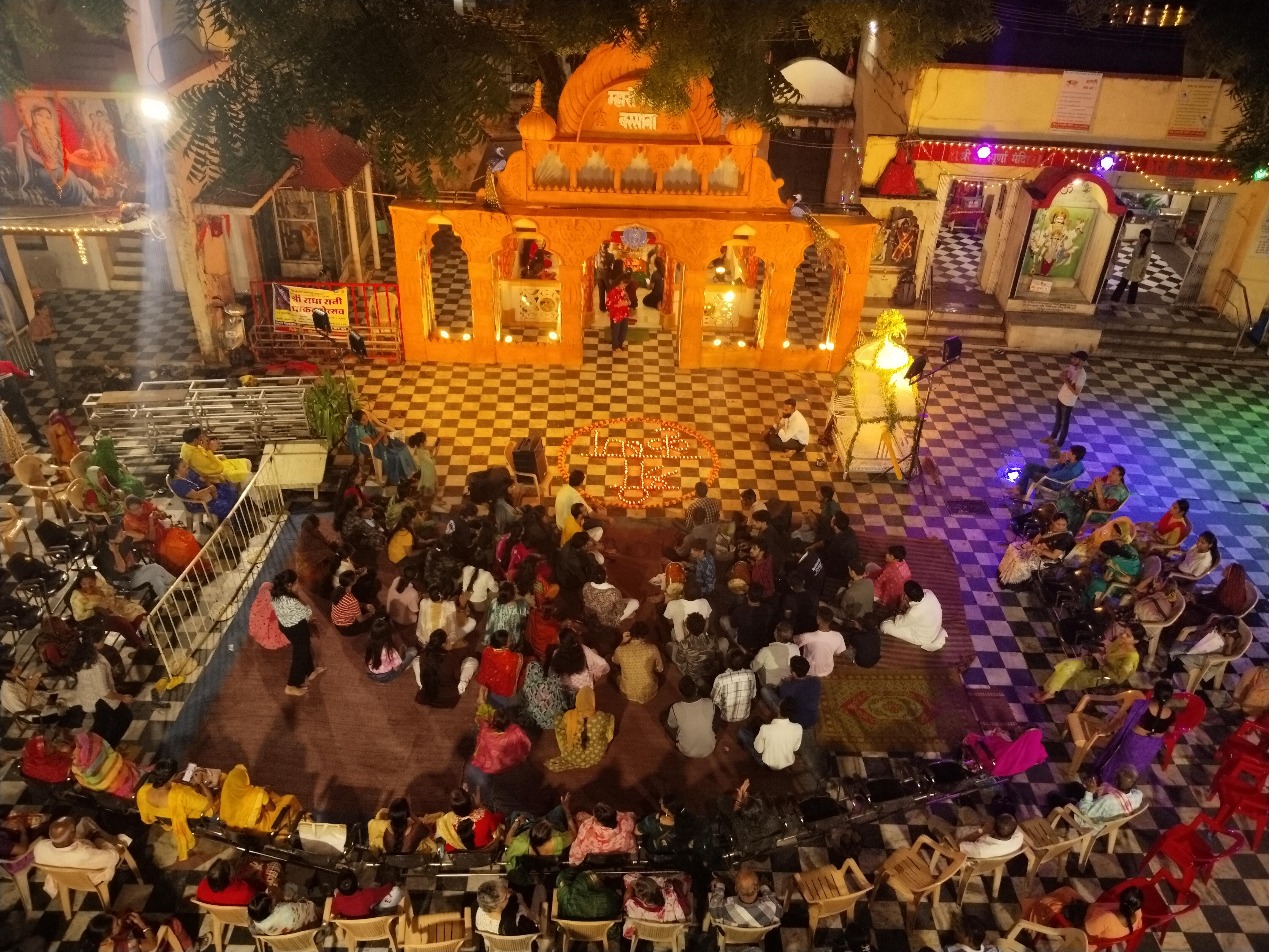 Festival crowd and devotional gathering near Geeta Bhawan in Indore