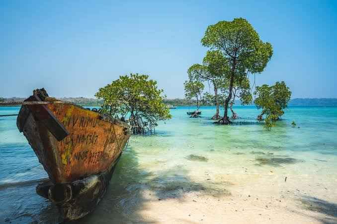 Relaxing on pristine Guitar Island Beach