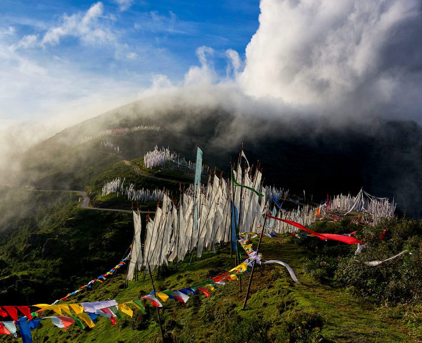 Chele La Pass with prayer flags and mountain views