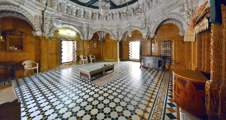 Temple interior and devotional ambience at Hathisingh Jain Temple