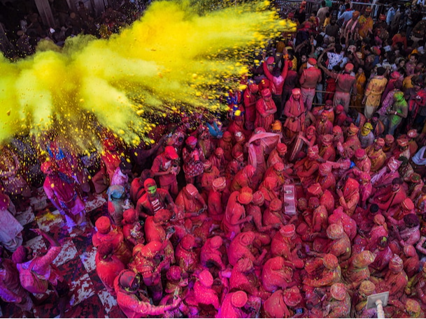 Holi preparation with colors and water guns in Mumbai