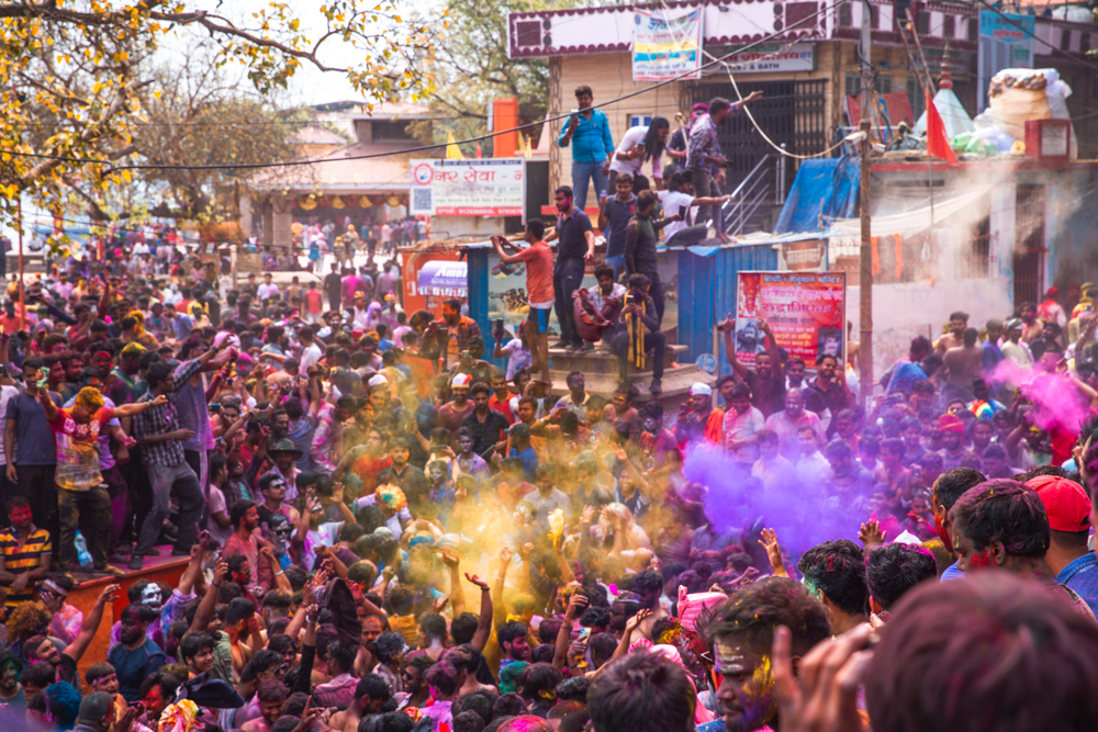 Holi celebrations at Varanasi ghats along the Ganges river