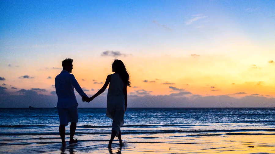 Couple watching sunset near Mumbai honeymoon destination
