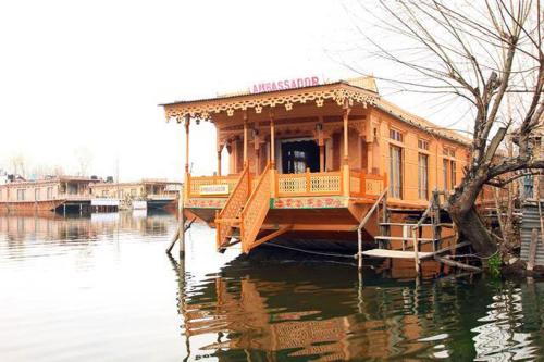 Traditional Kashmiri houseboat stay on Dal Lake
