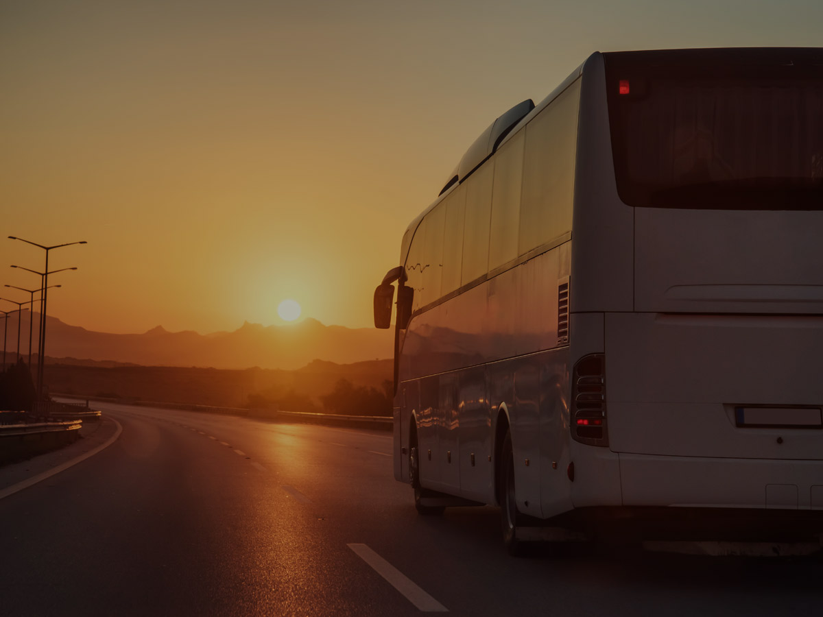 Luxury bus traveling through hilly roads to Shillong