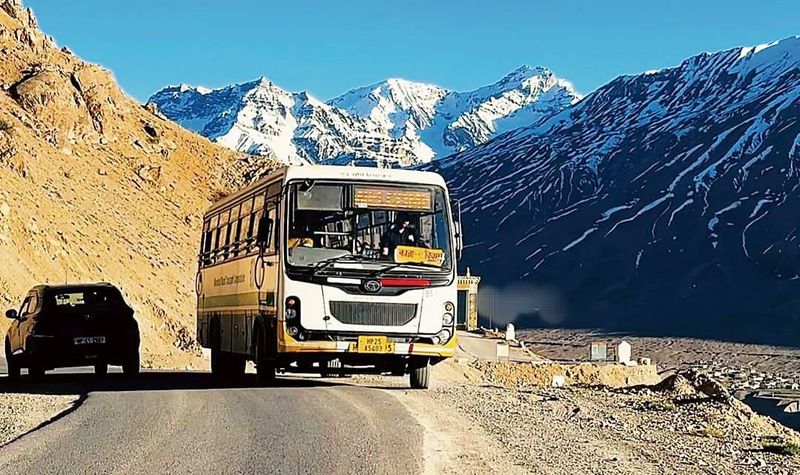 HRTC bus traveling through Spiti Valley mountains
