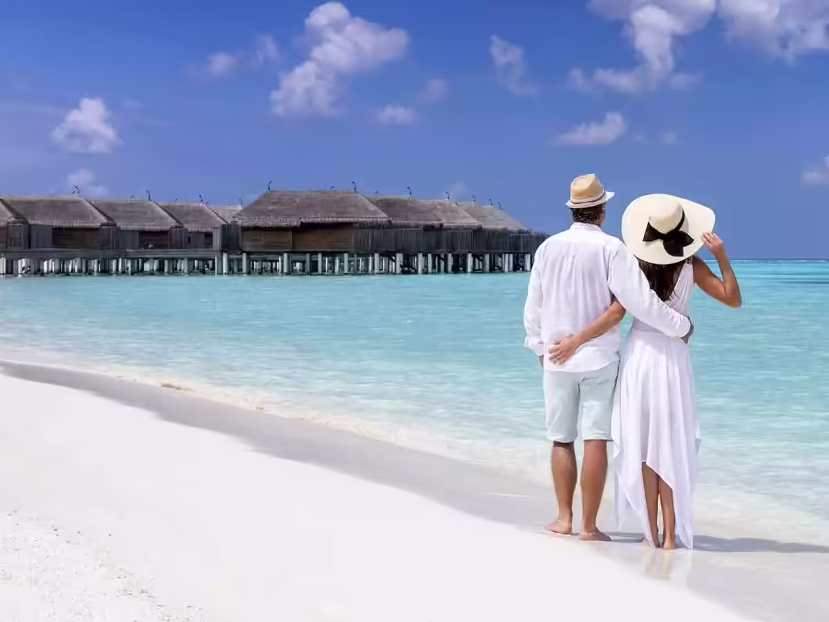 Romantic honeymoon couple on beach