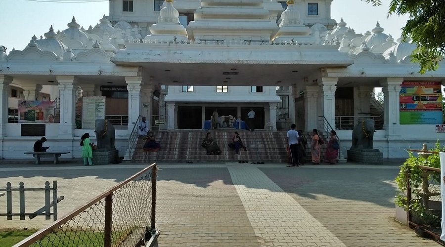 Temple courtyard and devotional movement at ISKCON Chennai