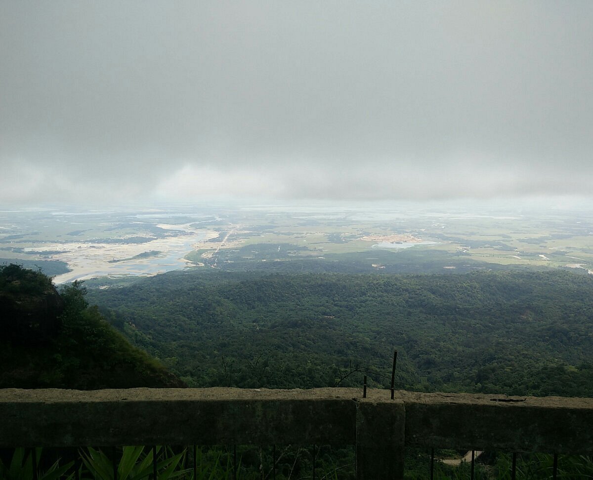 Misty atmosphere around the rock formation