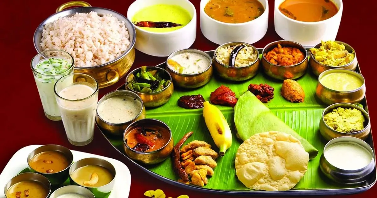 Traditional Kerala sadya meal served on banana leaf