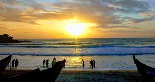 Sunset palmline and beach ambience in Kovalam