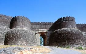 Historic gateway and stone approach path inside Kumbhalgarh Fort