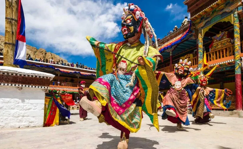 Sacred Cham dance performance with traditional masks at Hemis Festival